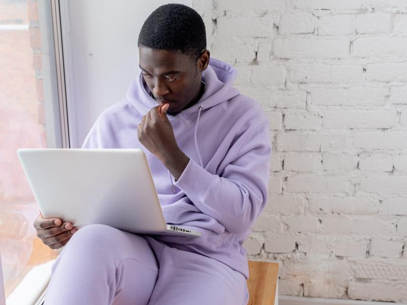 Man Looking at Computer Screen